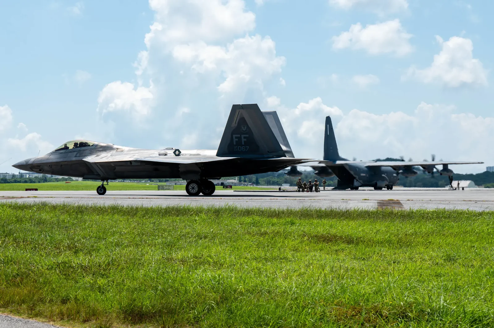 Aircraft operating at an Okinawa airfield, representative B&B TSUSHO INC. website context photograph